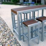 Bar height table with individual bar height stools