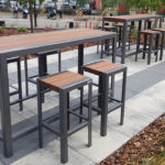 Bar height 1050 tables and backless stools