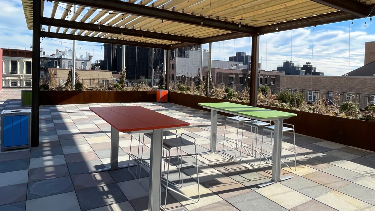 Ancora tables and Kontur stools on roof-top patio