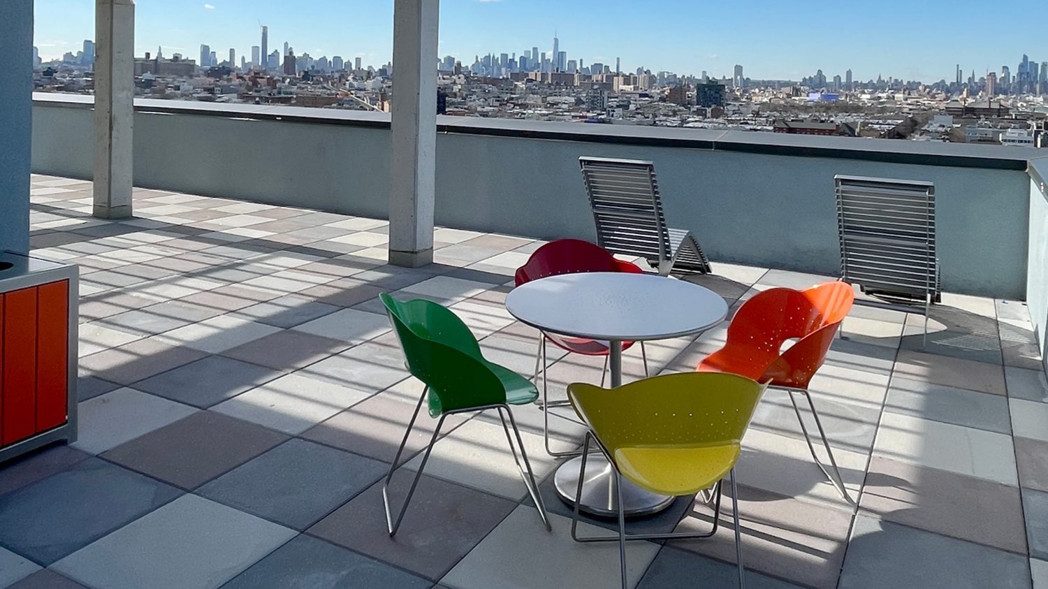 Battery Table and Chairs brightly painted on roof-top