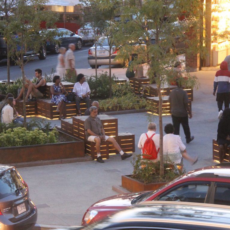 Byward Market with People sitting on crates