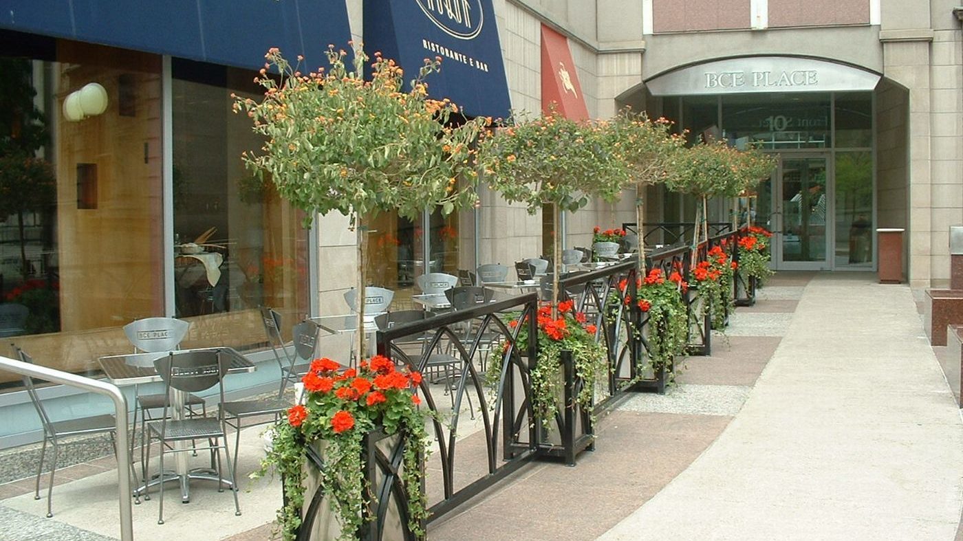 Custom Brookfield Place Planters with red flowers