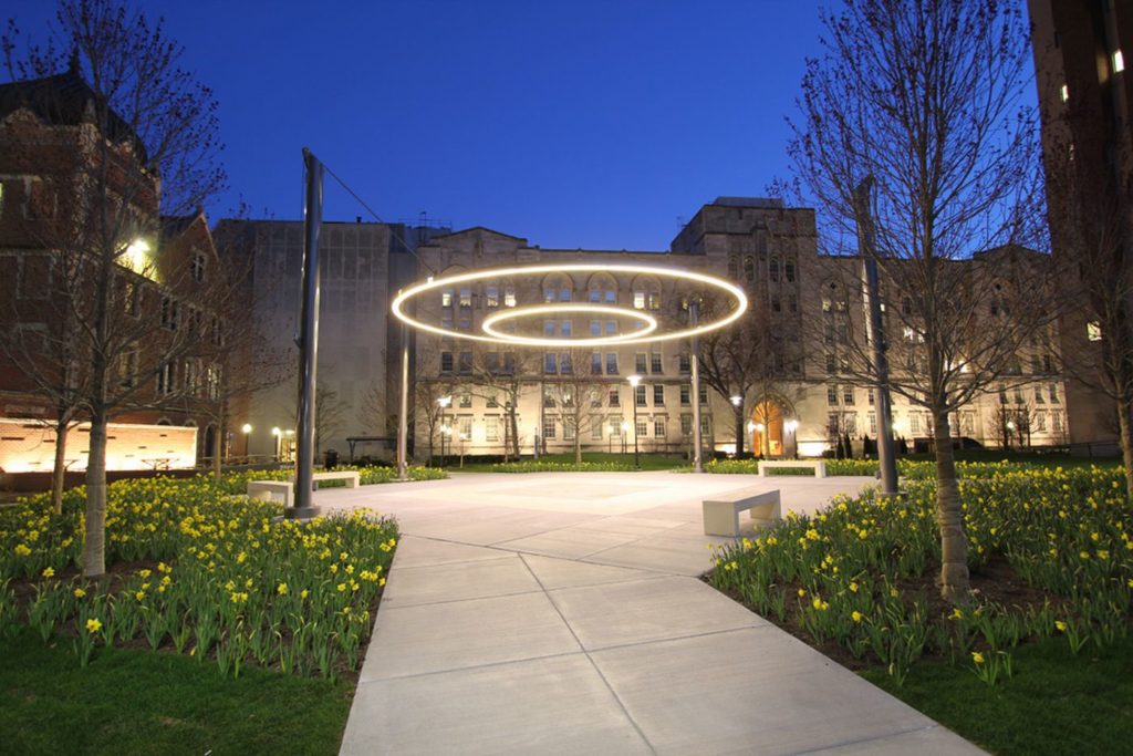 Crerar Quad circle of light suspending in the sky at night