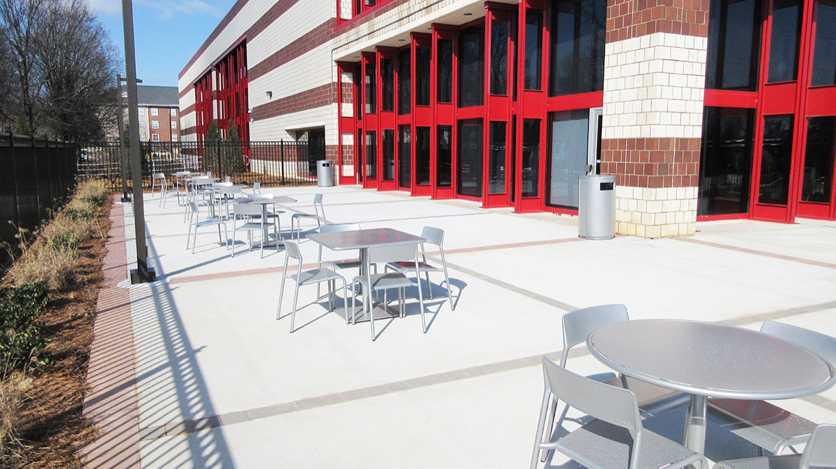 Round Table and Chairs Outside Building