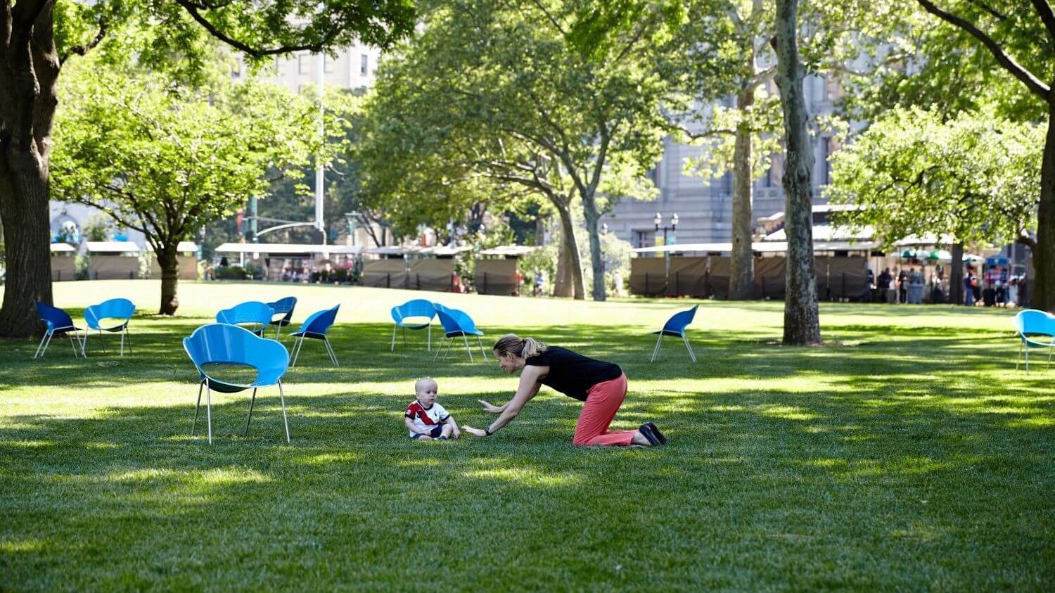 Blue chairs with woman and child