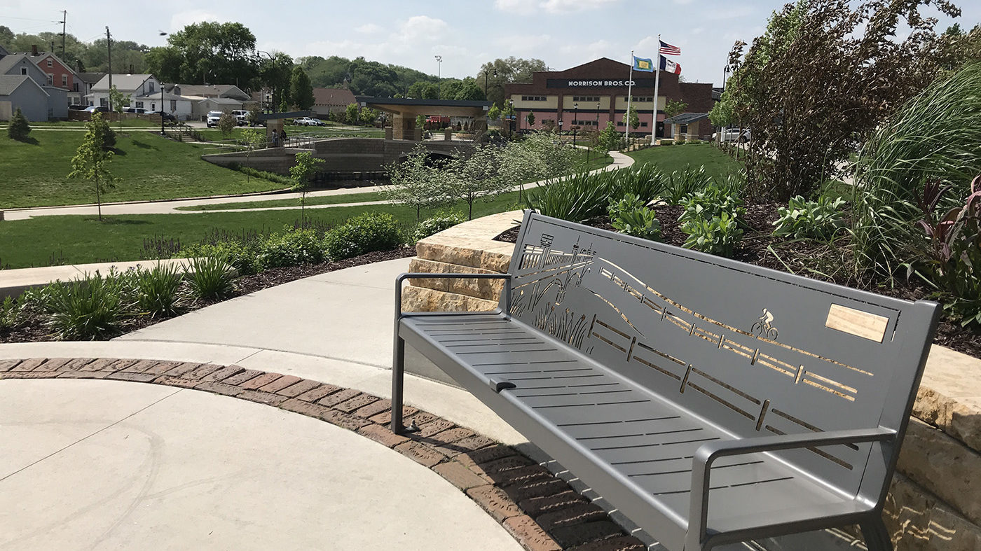 Custom laser cut Bee Branch Creek Bench in park setting