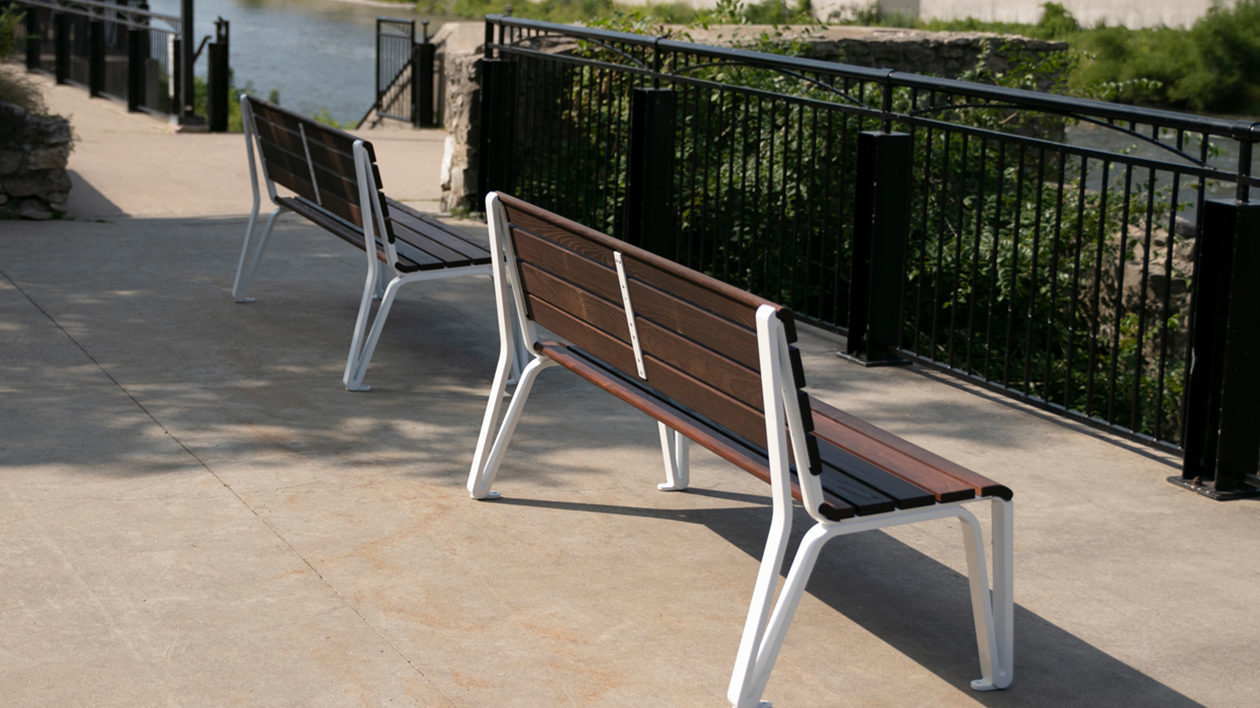 Two Backed Benches Facing Water