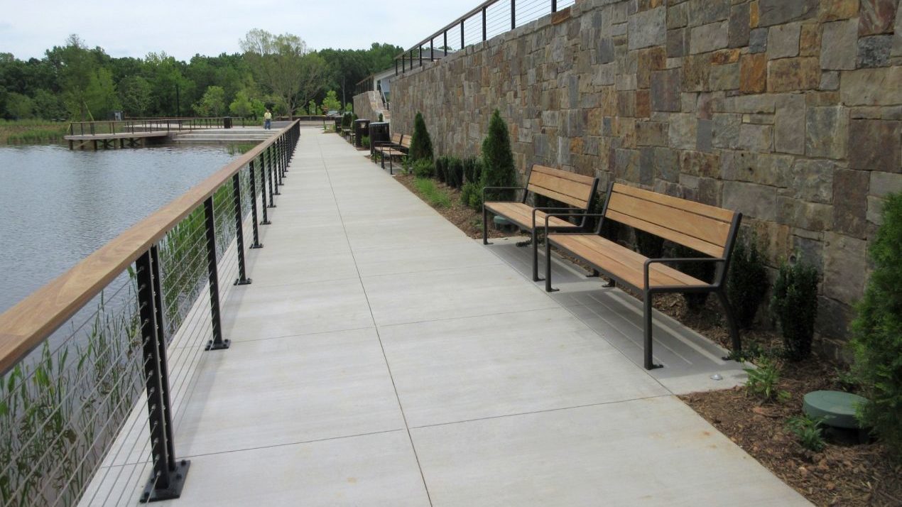 970 Backed wood benches facing water at Kingsley Town Center