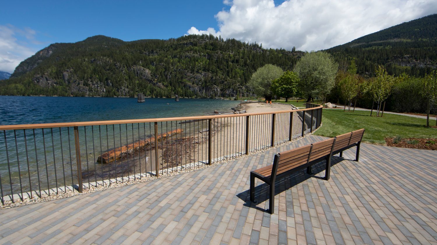 720 Backed Benches in front of beautiful water and mountains