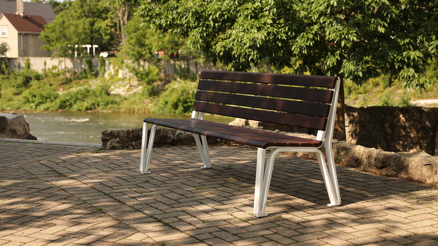 Iconic Backed Bench sitting under tree