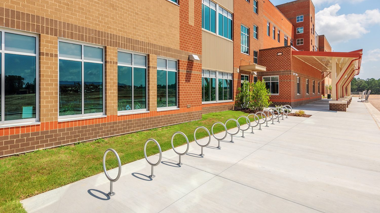 MBR-0150 Bike Racks lined up in front of school