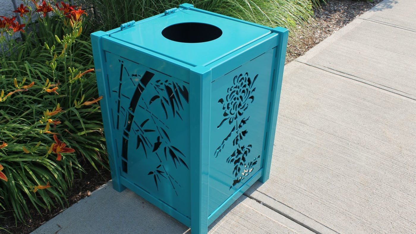 Blue Trash Can with Floral Design