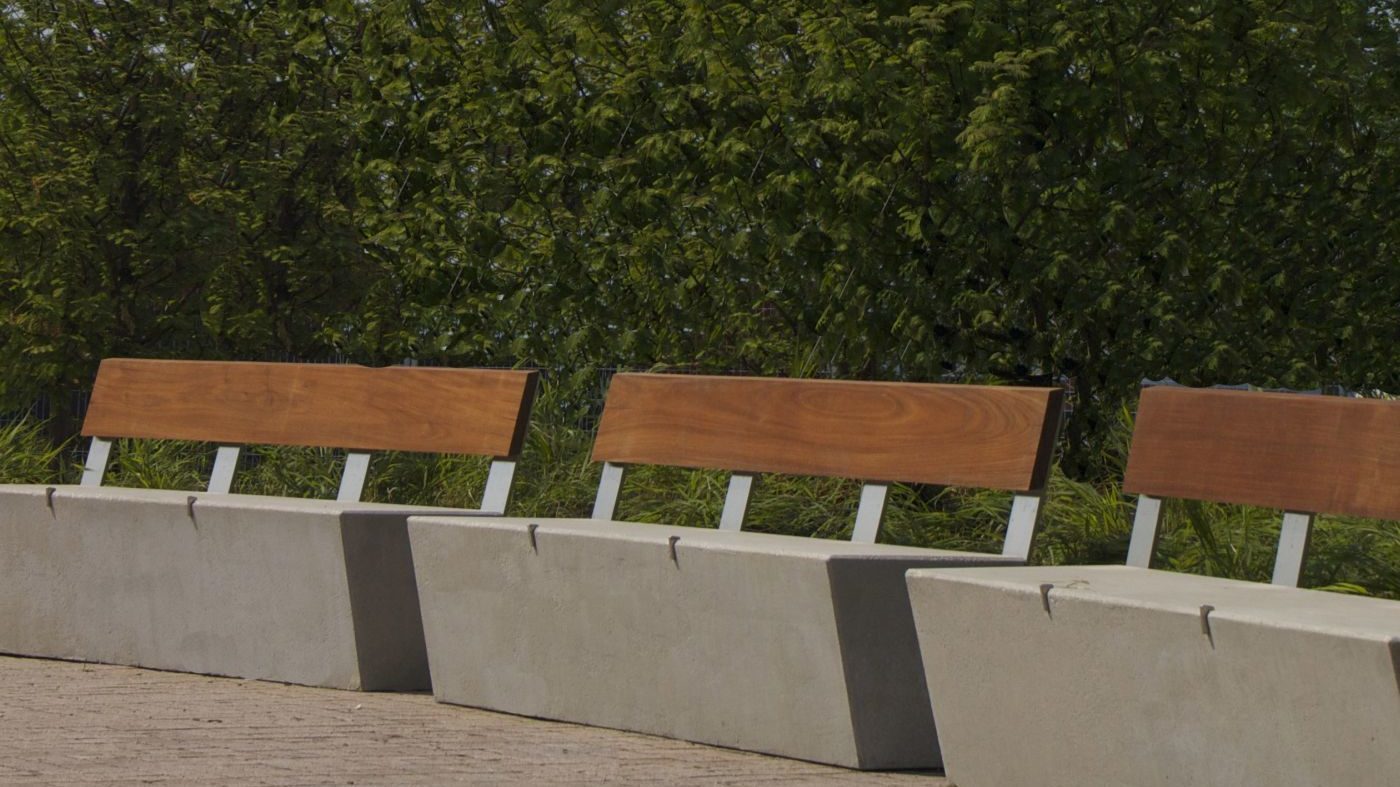 Three identical backed benches