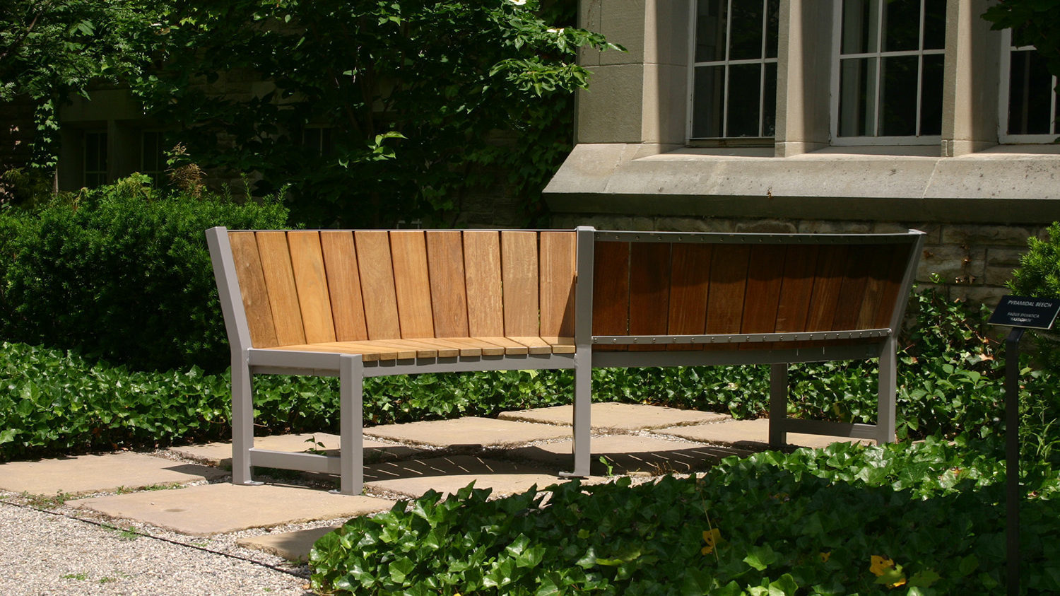 S Bench with facing seats in garden patio