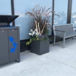 Garbage Unit, Planter and Backed Bench with Arms outside Building