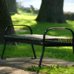 Backless Bench with Arms in Park