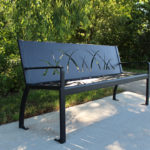 970 Bench with grass pattern sitting in park