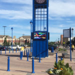 Blue Bollards around blue clock