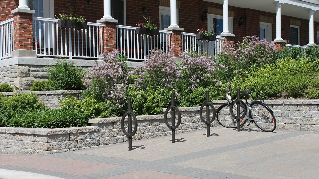 Black Direct Burial Bike Rack outside of Residential Area