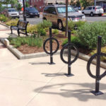 Three surface mount bike racks in black