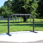 300 Style Bike Rack in park with sun shining and trees