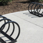 Two Black Bike Racks with four loops for attachment on each rack