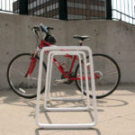 White Bike Rack with Red Bike