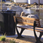 Bench and Trash Can Near River