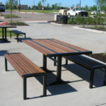 Benches and Table outside Building Near Parking Lot