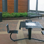 Black WheelChair Accessible Table with Chess Board inside Building