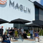 Employees sitting on the patio at Maglin Site Furniture