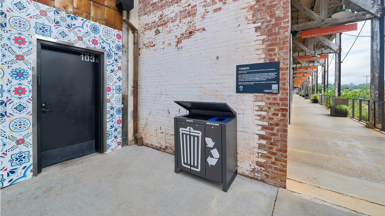 Lexicon trash and recycling unit against rustic brick wall