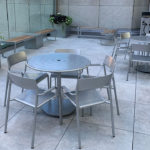 Silver Foro table and chairs, 1500 planters and Lexicon