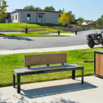 1050 Backed wood bench with wood trash container in neighborhood