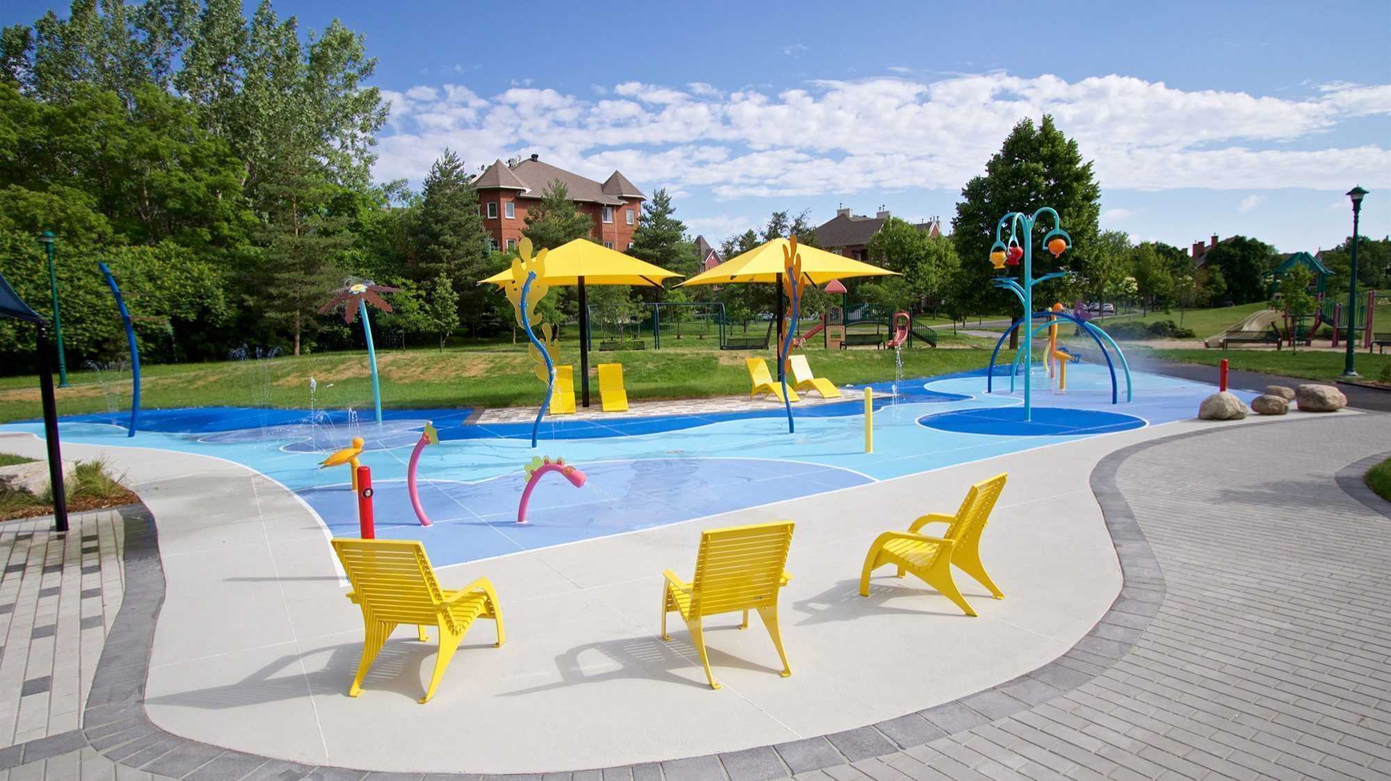 Yellow 720 Chairs surrounding splash pad