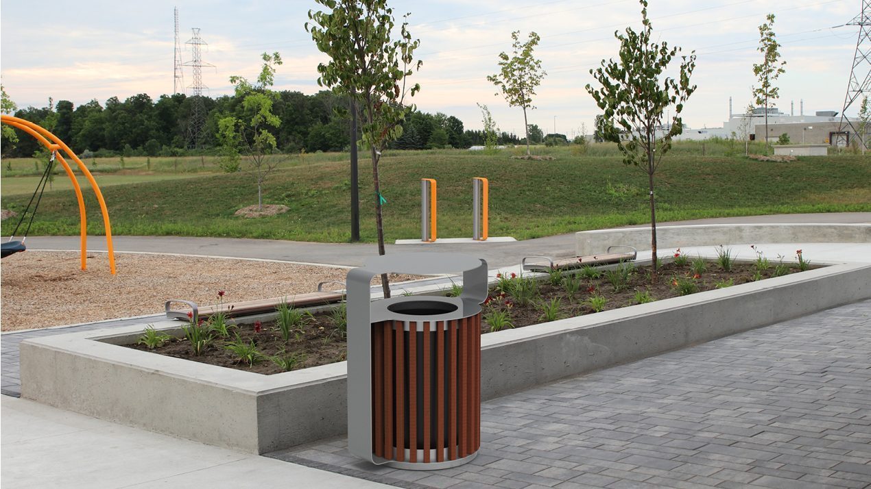 MUG Waste/Recycle Container with Rain Shield and MUG Bike Racks at a park