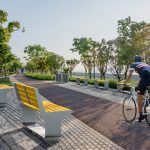 L-Series backed and backless benches along walking path