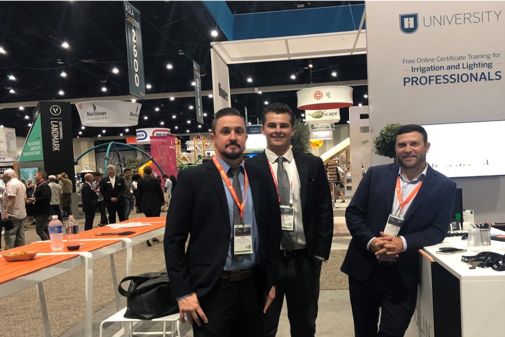 Adam, Brad and Andrew looking handsome at a tradeshow