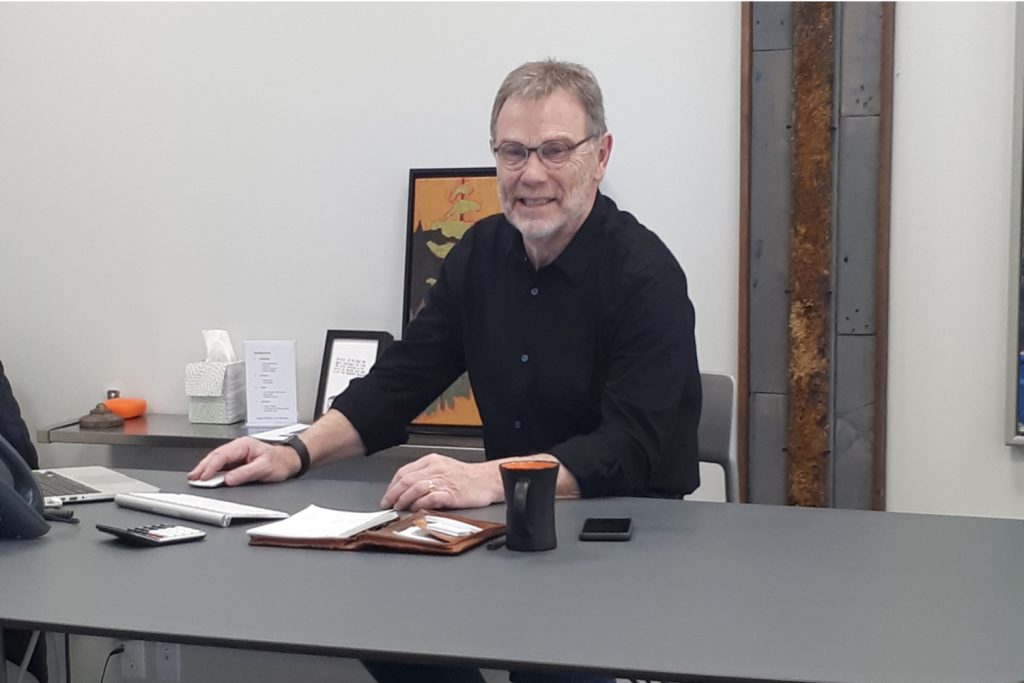 Ian working hard at his desk