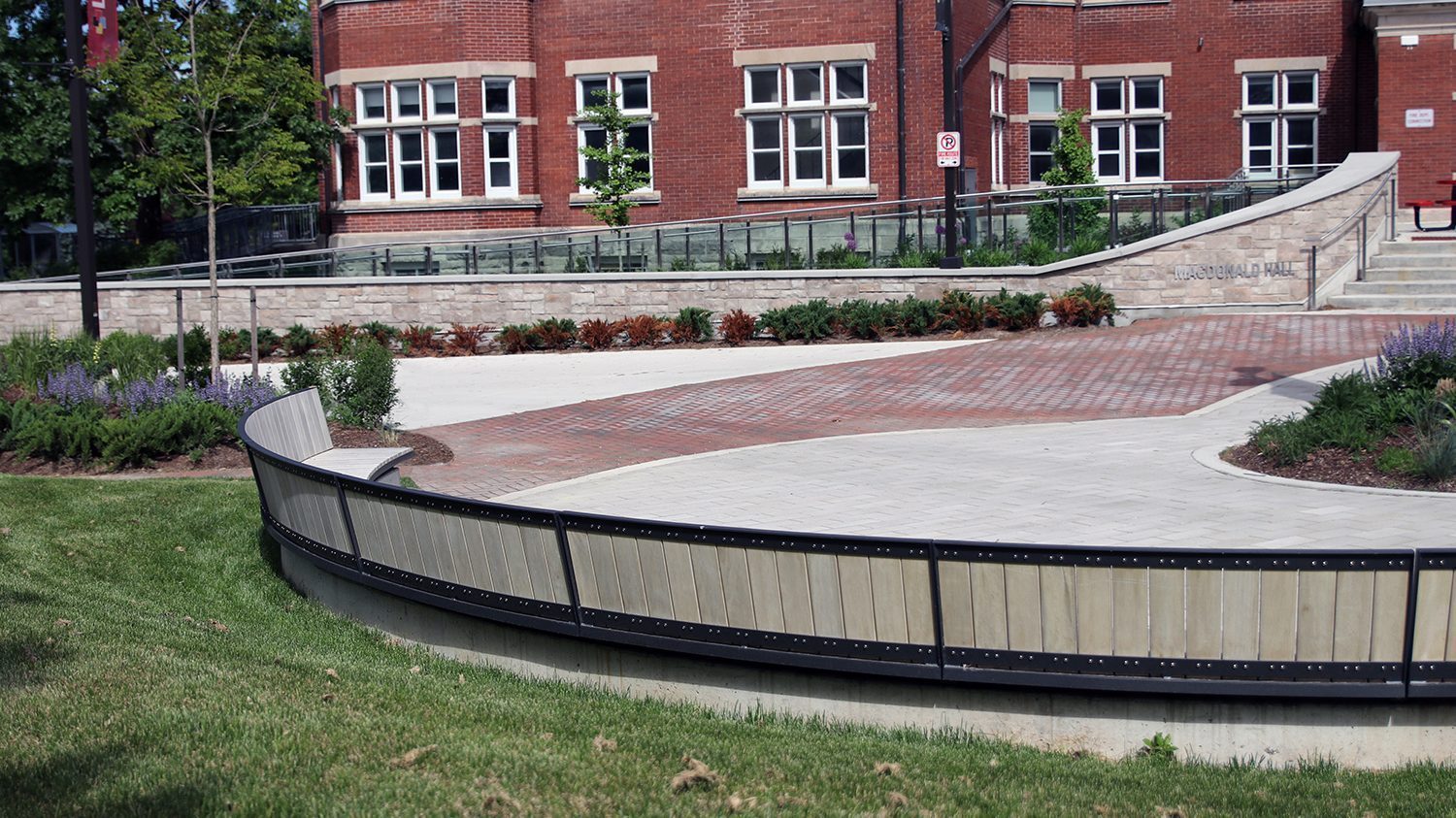 Curved Ogden Bench with custom wood at Lang Plaza