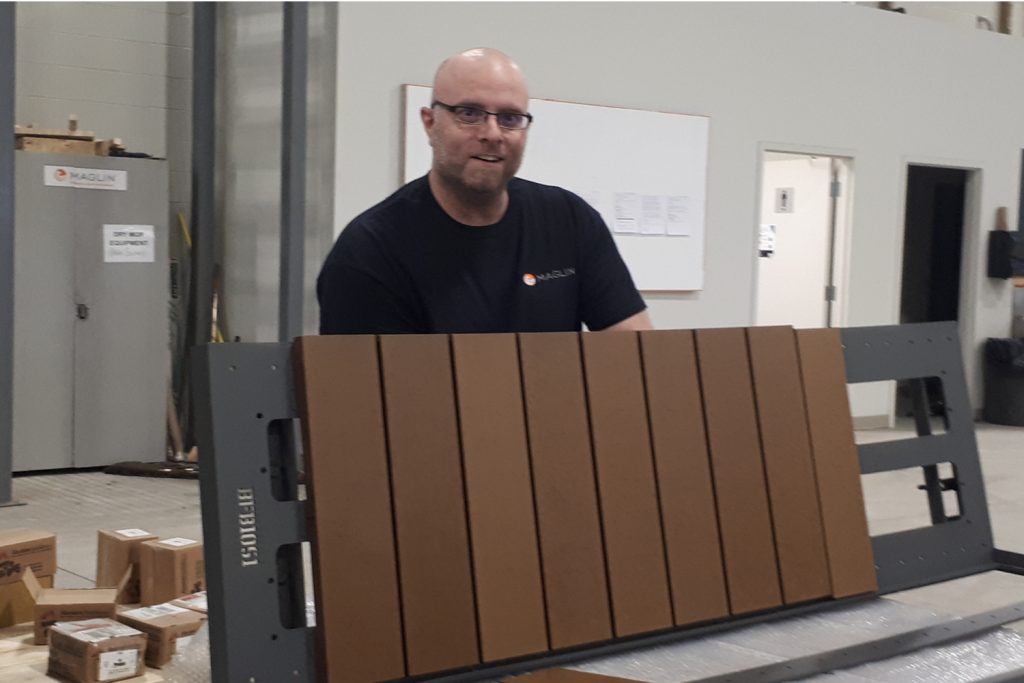 Steve Cope assembling a bench in the plant