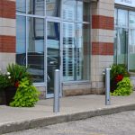 MBO-0500 Series Bollard in front of strip mall