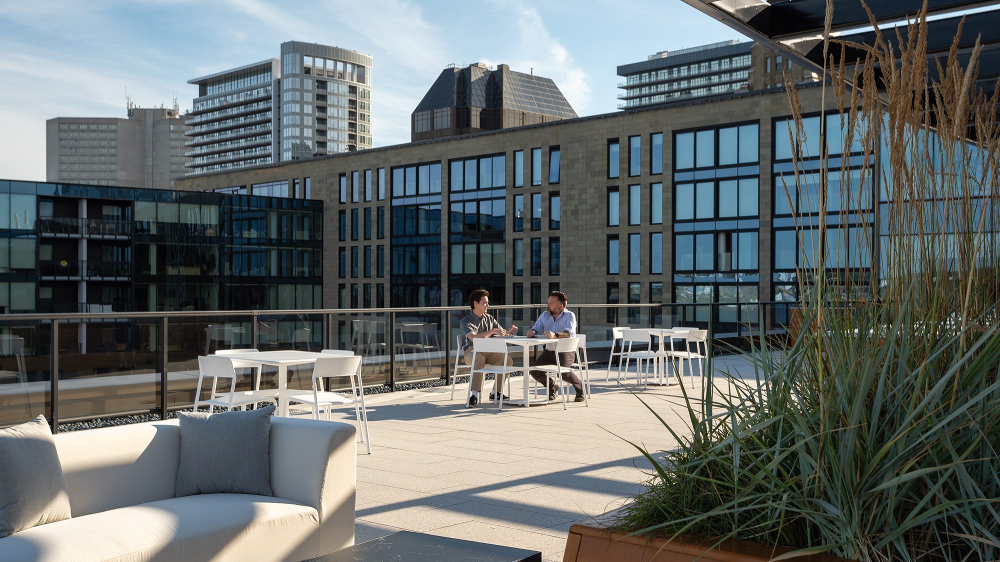 Foro Collection tables and seating on rooftop patio