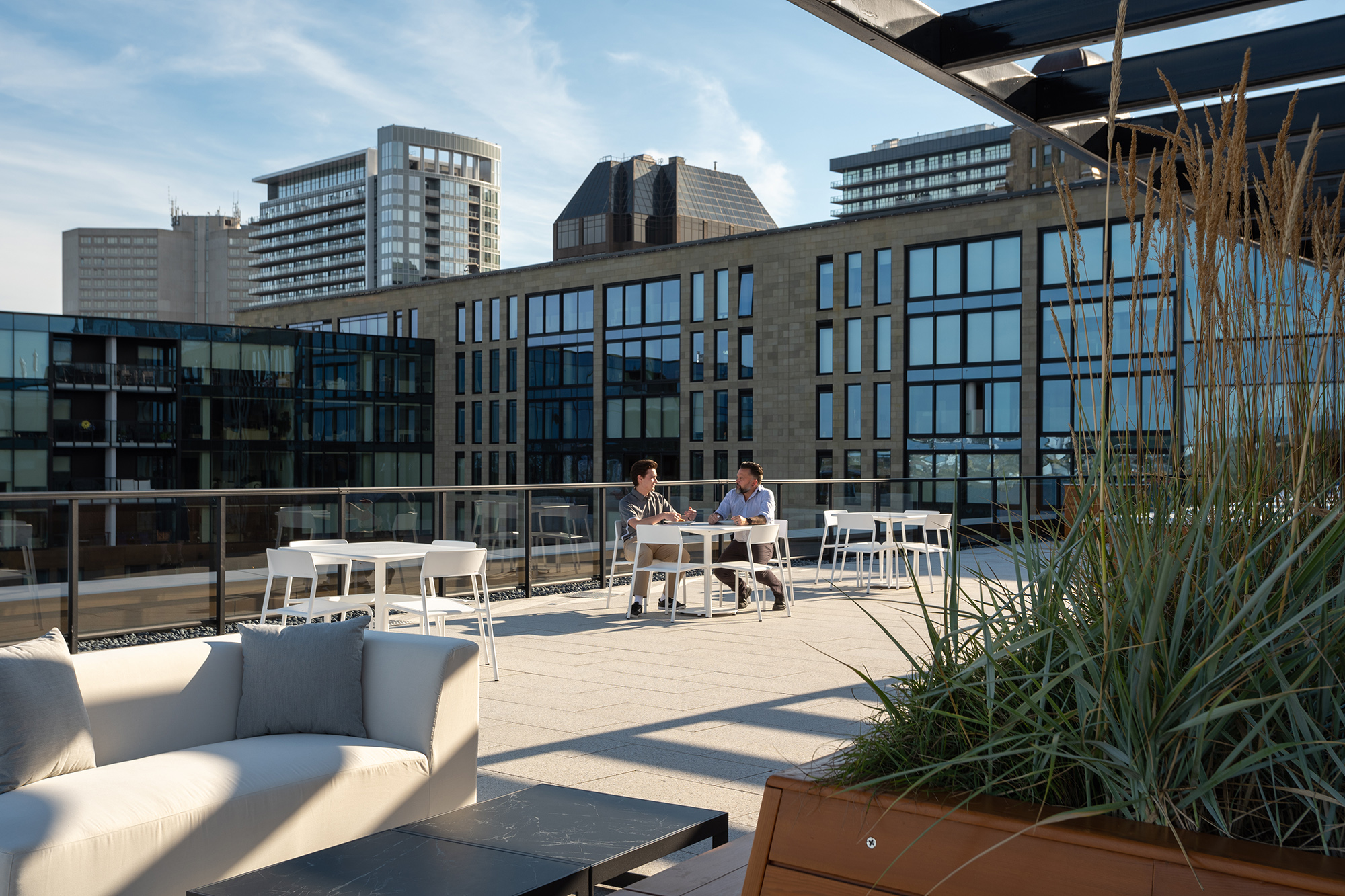 Foro Collection tables and seating on rooftop patio