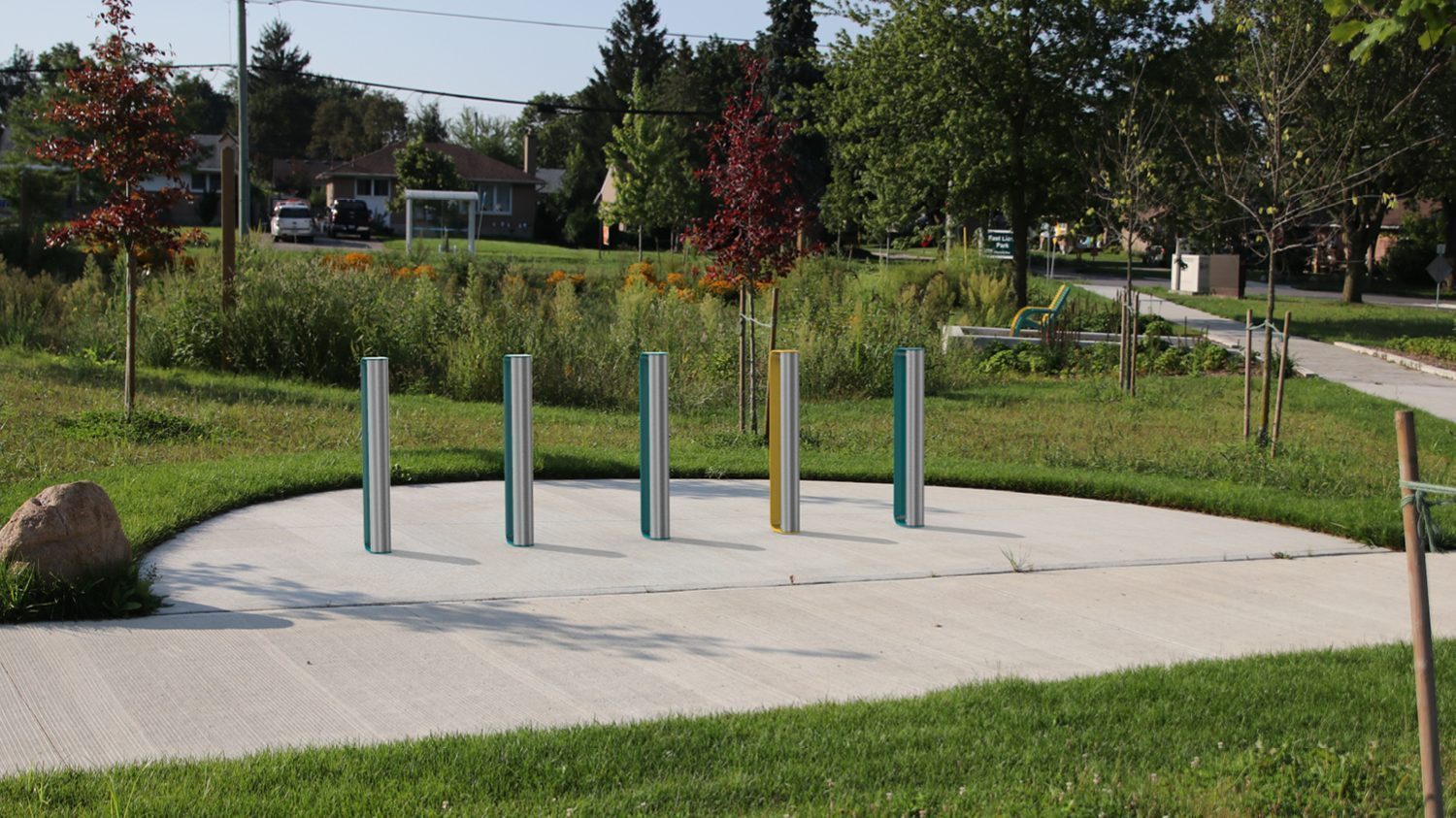 MUG Bike Racks in park setting