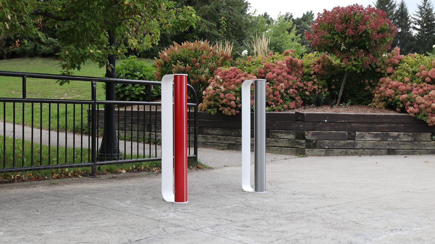 Red, Gunmetal and White MUG Bike Racks with greenery