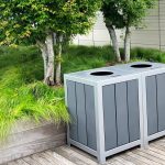 1050 Waste and Recycle Containers with bright green grasses in the background