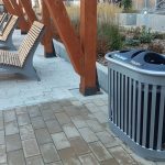 200 Series - 250 Recycle Receptacle and 720 Chaise Lounges occupy an outdoor patio